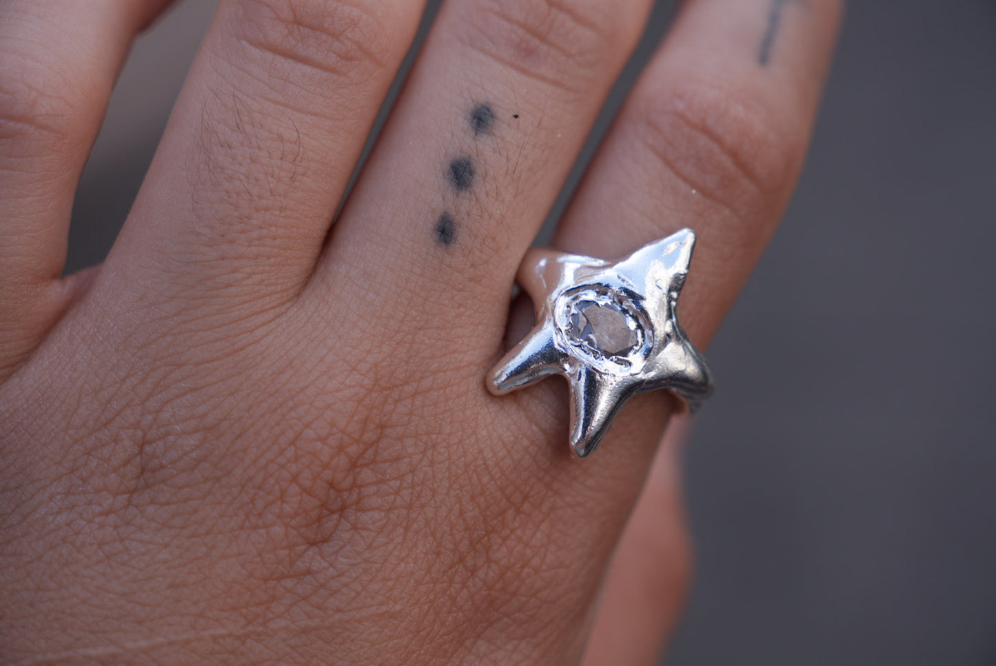 Star with a stone ring
