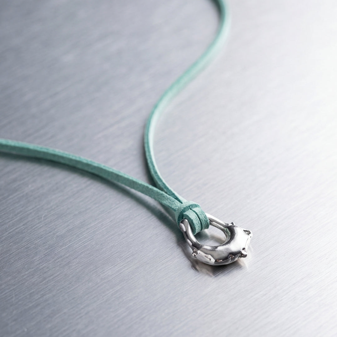 Teal leater & burnt silver necklace