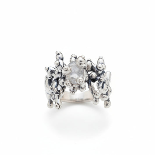 All over silver ring set with stone