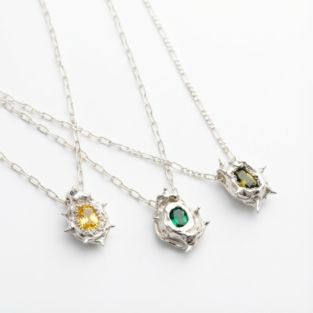 Spiky silver necklaces . Colorful stones. Hand made silver jewelry 